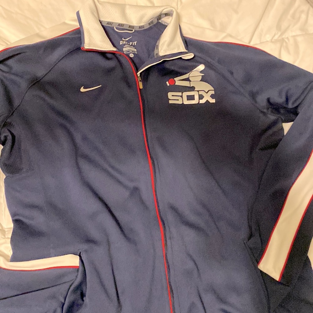 Women’s Nike Dri Fit track jacket like new!!Wht/Blue/Red & front zipper pockets,